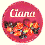 Beautifully decorated red velvet berry birthday cake with vibrant fruits and a glowing 'Ciana' name, adding a touch of sweetness and sparkle.