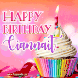 A vibrant birthday GIF featuring a rainbow-colored cupcake topped with white frosting, sprinkles, and a lit candle. The text reads 'Happy Birthday Ciannait' in bold pink and violet letters with white outline.