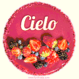 Beautifully decorated red velvet berry birthday cake with vibrant fruits and a glowing 'Cielo' name, adding a touch of sweetness and sparkle.
