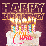 A colorful birthday cake topped with lit candles, with the words 'Happy Birthday Cilka' in bold glowing letters on a burgundy background. Animated flames add a festive touch.