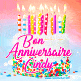 A white birthday cake covered in colorful sprinkles, topped with bright candles, and French text 'Bon Anniversaire Cindy' on a pastel gradient background in an animated GIF.
