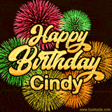 Golden text reading 'Happy Birthday Cindy' surrounded by vibrant fireworks in red, green, and yellow, set against a dark background in this celebratory birthday GIF.