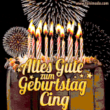 A chocolate birthday cake with glowing candles, the German text 'Alles Gute zum Geburtstag Cing,' and vibrant fireworks lighting up the background in an animated GIF.