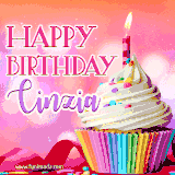 A vibrant birthday GIF featuring a rainbow-colored cupcake topped with white frosting, sprinkles, and a lit candle. The text reads 'Happy Birthday Cinzia' in bold pink and violet letters with white outline.