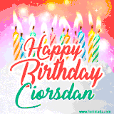 Bright birthday candles with rainbow flames on a cake, alongside the text 'Happy Birthday Ciorsdan' in vibrant script in this celebratory animated GIF.