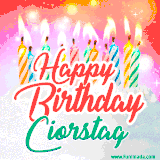 Bright birthday candles with rainbow flames on a cake, alongside the text 'Happy Birthday Ciorstag' in vibrant script in this celebratory animated GIF.