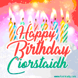 Bright birthday candles with rainbow flames on a cake, alongside the text 'Happy Birthday Ciorstaidh' in vibrant script in this celebratory animated GIF.