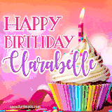 A vibrant birthday GIF featuring a rainbow-colored cupcake topped with white frosting, sprinkles, and a lit candle. The text reads 'Happy Birthday Clarabelle' in bold pink and violet letters with white outline.