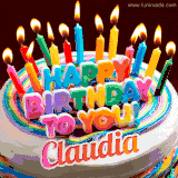 A colorful birthday cake topped with lit candles, with the words 'Happy Birthday Claudia' in bold glowing letters on a burgundy background. Animated flames add a festive touch.