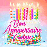 A white birthday cake covered in colorful sprinkles, topped with bright candles, and French text 'Bon Anniversaire Connie' on a pastel gradient background in an animated GIF.