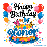 A gourmet birthday cake with colorful blossoms and butterfly toppers on a blue pedestal, custom-made for Conor.
