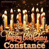 A glowing personalized birthday GIF with name Constance featuring lit candles with intricate designs, warm lighting, and the text 'Happy Birthday' in an elegant font.