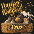 Celebrate Cruz's birthday with a GIF featuring chocolate cake, a lit sparkler, and golden stars