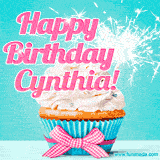 A festive cupcake with pink icing, a gingham bow, and a lit animated sparkler, paired with 'Happy Birthday Cynthia!' in bright pink text.