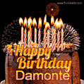 A rich chocolate cake topped with glowing birthday candles and surrounded by bright fireworks. The animated GIF displays the message 'Happy Birthday Damonte' in golden text.