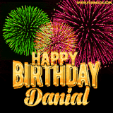 A captivating GIF with bursts of green, pink, and orange fireworks lighting up the night sky, accompanied by 'Happy Birthday Danial' in glowing golden text.