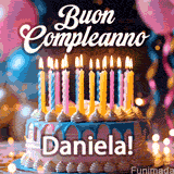 Birthday cake topped with pink and yellow lit candles, surrounded by glowing bokeh lights and party balloons. The greeting 'Buon Compleanno Daniela GIF!' is displayed.