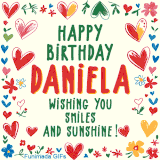A colorful animated card for Daniela’s birthday featuring playful hearts, cheerful flowers, and a handwritten message wishing smiles and sunshine.