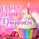 A vibrant birthday GIF featuring a rainbow-colored cupcake topped with white frosting, sprinkles, and a lit candle. The text reads 'Happy Birthday Dayanara' in bold pink and violet letters with white outline.