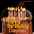A rich chocolate cake topped with glowing birthday candles and surrounded by bright fireworks. The animated GIF displays the message 'Happy Birthday Daylan' in golden text.