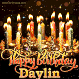 A glowing personalized birthday GIF with name Daylin featuring lit candles with intricate designs, warm lighting, and the text 'Happy Birthday' in an elegant font.