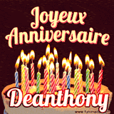 A Happy Birthday GIF in French featuring a festive birthday cake adorned with bright candles and the glowing text 'Joyeux Anniversaire Deanthony' in a cheerful style.