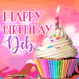 A vibrant birthday GIF featuring a rainbow-colored cupcake topped with white frosting, sprinkles, and a lit candle. The text reads 'Happy Birthday Deb' in bold pink and violet letters with white outline.