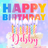 A vibrant animated name GIF with the words 'Happy Birthday Debby' with colorful candles on a creamy cake. The background sparkles with pastel shades, adding a festive touch.