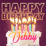 A colorful birthday cake topped with lit candles, with the words 'Happy Birthday Debby' in bold glowing letters on a burgundy background. Animated flames add a festive touch.