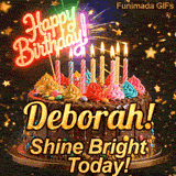 Happy Birthday Deborah animated image showcasing a decorated chocolate cake on a pedestal with glowing candles.