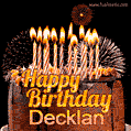 A rich chocolate cake topped with glowing birthday candles and surrounded by bright fireworks. The animated GIF displays the message 'Happy Birthday Decklan' in golden text.