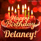 Beautifully decorated red velvet berry birthday cake with vibrant fruits and a glowing 'Delaney' name, adding a touch of sweetness and sparkle.