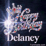 White lens flare effect glowing from crystal-encrusted cursive letters spelling Happy Birthday on a dark starry background.Delaney
