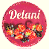 Beautifully decorated red velvet berry birthday cake with vibrant fruits and a glowing 'Delani' name, adding a touch of sweetness and sparkle.