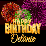 A golden 'Happy Birthday Delanie' message with vibrant fireworks in the background, creating a festive and celebratory vibe in this animated name GIF.