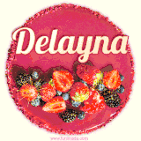 Beautifully decorated red velvet berry birthday cake with vibrant fruits and a glowing 'Delayna' name, adding a touch of sweetness and sparkle.