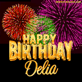 A golden 'Happy Birthday Delia' message with vibrant fireworks in the background, creating a festive and celebratory vibe in this animated name GIF.