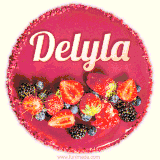 Beautifully decorated red velvet berry birthday cake with vibrant fruits and a glowing 'Delyla' name, adding a touch of sweetness and sparkle.
