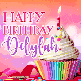 A vibrant birthday GIF featuring a rainbow-colored cupcake topped with white frosting, sprinkles, and a lit candle. The text reads 'Happy Birthday Delylah' in bold pink and violet letters with white outline.