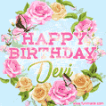 A charming animated GIF featuring 'Happy Birthday Devi' in pink and green text, surrounded by delicate roses, leaves, and fluttering butterflies on a soft light blue pastel background.