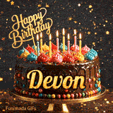 Glittery dark background with golden stars behind a chocolate birthday cake with the name Devon written on the front.