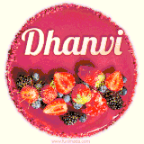 Beautifully decorated red velvet berry birthday cake with vibrant fruits and a glowing 'Dhanvi' name, adding a touch of sweetness and sparkle.