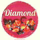 Beautifully decorated red velvet berry birthday cake with vibrant fruits and a glowing 'Diamond' name, adding a touch of sweetness and sparkle.