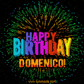 A colorful animated GIF featuring the text 'Happy Birthday Domenico!' in rainbow colors with a dynamic iridescent firework display in the background.