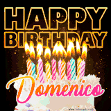 A vibrant animated GIF featuring a delicious birthday cake topped with glowing candles and the name 'Domenico' in elegant script, and the words 'Happy Birthday' on the black background.