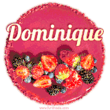 Beautifully decorated red velvet berry birthday cake with vibrant fruits and a glowing 'Dominique' name, adding a touch of sweetness and sparkle.