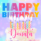 A vibrant animated name GIF with the words 'Happy Birthday Donata' with colorful candles on a creamy cake. The background sparkles with pastel shades, adding a festive touch.