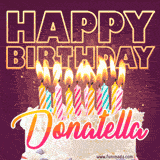 A colorful birthday cake topped with lit candles, with the words 'Happy Birthday Donatella' in bold glowing letters on a burgundy background. Animated flames add a festive touch.