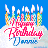 A cheerful animated GIF featuring colorful lit birthday candles on a white cake, with the text 'Happy Birthday Donnie' in bold red and blue script on a bright blue background.