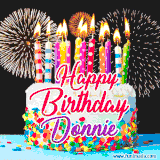 A lively happy birthday animated GIF showcasing a colorful birthday cake covered in sprinkles, topped with glowing candles, and surrounded by vibrant fireworks. The name 'Donnie' is featured in elegant script.